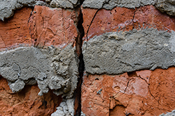 Aged and cracked masonry found by Asbury Park fireplace service